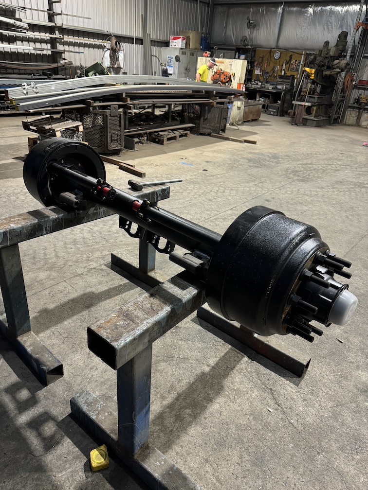 Axle assembly fabricated and welded in the workshop